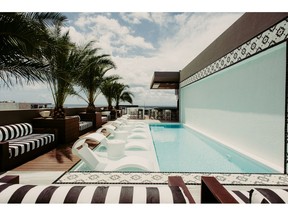 Rooftop pool and bar at Marquee Playa Hotel in Playa Del Carmen, Mexico.