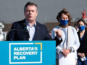 Alberta Premier Jason Kenney, Energy Minister Sonya Savage, and Associate Minister of Natural Gas and Electricity Dale Nally announce the Alberta recovery plan Tuesday.