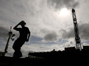 Workers from Northern Dynasty Minerals drill core samples from the proposed Pebble Mine site in 2007.