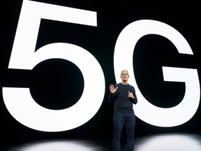 Apple CEO Tim Cook talking about the value of 5G for customers at an Apple event Tuesday.
