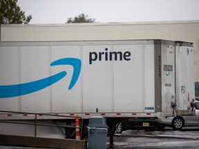 Signage is displayed on a trailer outside an Amazon delivery station in Moonachie, New Jersey, U.S., on Tuesday, Oct. 13, 2020.