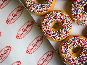 Restaurant Brands International says it expects Tim Hortons sales to slide globally.