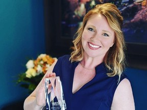 Coconut Software founder Katherine Regnier with her Women Entrepreneurs of Saskatchewan award in March 2020.