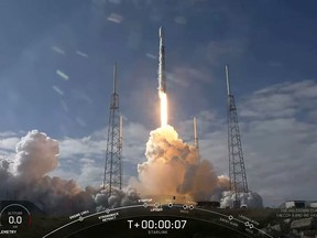 This video still image grab provided by SpaceX shows a SpaceX Falcon 9 rocket as it lifts off to launch 60 new Starlink satellites into orbit from Cape Canaveral Air Force Station, Florida on February 17, 2020.