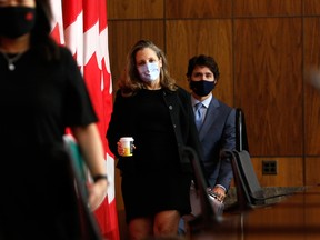 Chrystia Freeland, Canada's deputy prime minister and minister of finance, and Justin Trudeau, Canada's prime minister, leave following a news conference in Ottawa.