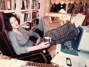 Barbara Amiel at home with her books and computer in 1984.