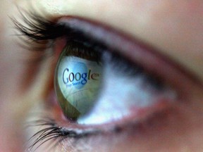 The Google logo is reflected in a human eye. The search engine handles 2 trillion searches every year, giving it a 93 per cent market share.