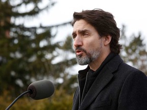 Justin Trudeau, Canada's prime minister, announces legislation setting setting emissions reduction targets for Canada to achieve its net-zero pledge by 2050 during a news conference at the Ornamental Gardens in Ottawa, on Thursday.
