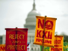 Demonstrators protest against the Keystone XL pipeline on the National Mall in Washington, D.C. in April, 2014. Joe Biden was vice-president when his former boss, Barack Obama, blocked the pipeline in 2015, and much of his support in the Nov. 3 election came from voters who want him to restore Obama’s legacy.