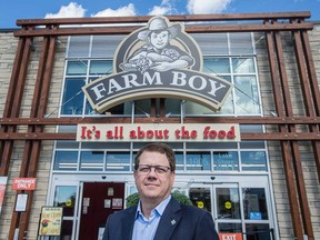 Michael Medline, president and CEO of Empire Company Limited, stands outside of a Farmboy store in Toronto. Empire bought the Farm Boy chain in southern Ontario in September 2018.