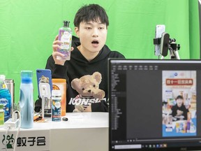 A livestreamer promotes personal hygiene products at a livestreaming base during Alibaba Group Holding Ltd.'s annual November 11 Singles' Day online shopping event in China.