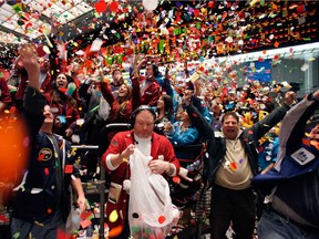 Traders celebrate as confetti falls at the close of trading at the CME Group Inc.'s Chicago Board of Trade on the last trading day of 2009. Despite many calls for another correction, U.S. equity markets went on to gain 17 per cent in 2010 and continued to rally at a compounded annual growth rate of 12.5 per cent over the next decade.