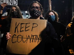 People participate in a protest in support of counting all votes as the election in Pennsylvania remains unresolved.