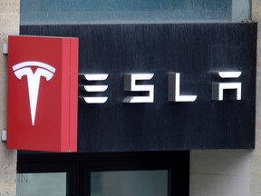 The S&P 500  will admit Tesla Inc. through its club doors for the first time next month.