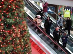 Shoppers in the Eaton Centre in Toronto, on Nov. 21, 2020.