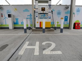 H2 logo sits at a hydrogen charging pump at a Royal Dutch Shell petrol filling station in the U.K.