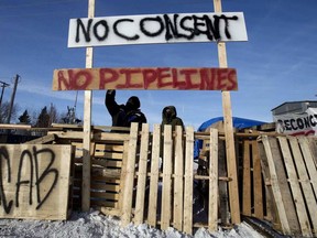 Protesters block a rail line in Edmonton in solidarity with Wet'suwet'en hereditary chiefs, on Feb. 19, 2020.