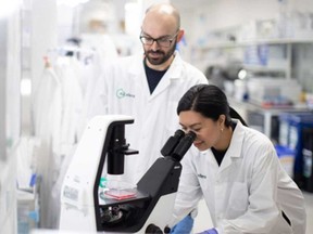 Scientists work in an AbCellera Biologics Inc. lab. Bamlanivimab, the drug developed by AbCellera and Eli Lily, was authorized last month by Health Canada and the U.S. Food and Drug Administration to treat mild-to-moderate symptoms of COVID-19.