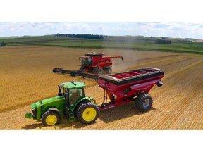 Driverless Ag Technology: AutoCart® by Raven in use with a CNHi Combine