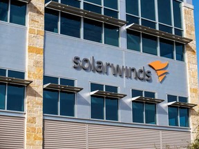 The SolarWinds logo is seen outside its headquarters in Austin, Texas. The largest shareholders in SolarWinds agreed to sell CPPIB a 5 per cent stake for US$315 million on Dec. 7, just days before tech company's public disclosure of the hack crushed its stock price more than 20 per cent.