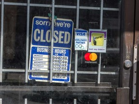 A closed sign on a Toronto store during the COVID 19 pandemic.
