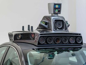 Cameras on a pilot model of an Uber self-driving car are displayed at the Uber Advanced Technologies Center in Pittsburgh, Pennsylvania.