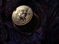 A stack of bitcoins. The Bank of Canada determined an official digital currency may become necessary if there were to be a dramatic shift in consumer behaviour.