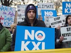 Opponents of the Keystone XL and Dakota Access pipelines hold a rally as they protest U.S. President Donald Trump's executive orders advancing their construction, at Lafayette Park next to the White House in Washington, D.C, on January 24, 2017.