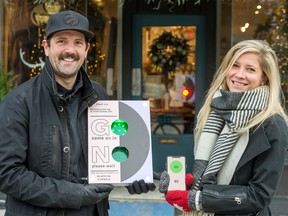 Damian and Tara Wright stand with their invention TraffikFlo outside Home Smith, an interior design store, in Toronto.