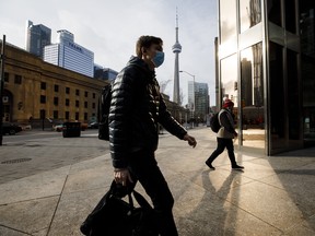 Pedestrians in downtown Toronto during the start of the city's second lockdown in November.