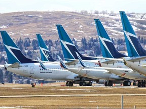 Dozens of WestJet planes are being parked around the Calgary International Airport after the COVID-19 pandemic shut down most passenger air traffic around the world.