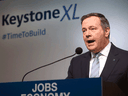 Alberta Premier Jason Kenney speaks in Calgary on March 31, 2020 about the the plan to kick-start construction on the Keystone XL pipeline.