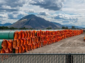 Steel pipe to be used in the oil pipeline construction of the Canadian government’s Trans Mountain Expansion Project lies at a stockpile site in Kamloops, British Columbia.