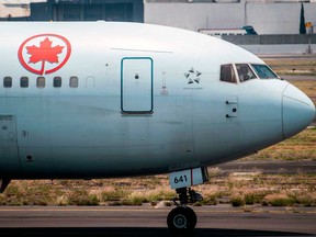 Air Canada said on Wednesday it will cut its first-quarter capacity by an additional 25 per cent, resulting in a workforce reduction of about 1,700 employees.