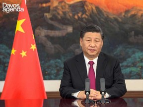 China's President Xi Jinping speaks from Pekin as he opens an all-virtual World Economic Forum, which usually takes place in Davos, Switzerland.