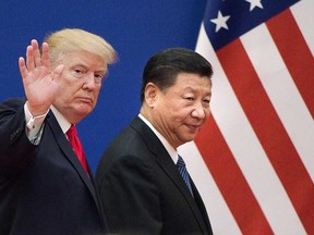 U.S. President Donald Trump, left, and China's President Xi Jinping during a visit in November, 2017.