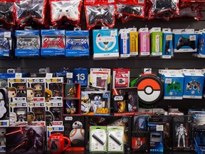 Gaming accessories and Star Wars merchandise are displayed at a GameStop Corp. store in New York. Before 2020 the stock had fallen six straight years as earnings shrunk, and which isn't projected to turn a profit before fiscal 2023.