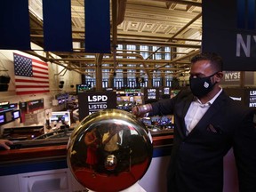 Lightspeed POS Inc CEO Dax Dasilva rings the bell at the New York Stock Exchange at the IPO of his company on Sept. 11 2020.