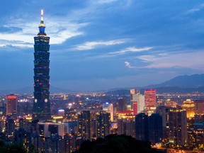 Residential and commercial buildings rise out of the skyline of Taipei, Taiwan. If Taiwan were to be included in the CPTPP, it would be the fifth-largest economy in the partnership, behind only Japan, Canada, Australia and Mexico.