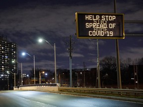 A highway sign encouraging people to stay home in Toronto.