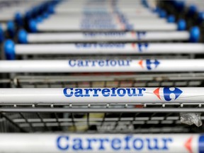 The logo of French retailer Carrefour on shopping trolleys in Sao Paulo, Brazil.