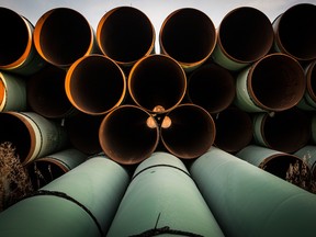 Miles of unused pipe, prepared for the Keystone XL pipeline, sit in a lot on October 14, 2014 outside Gascoyne, North Dakota.