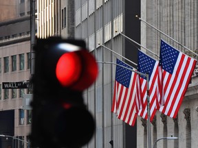 U.S. equities tumbled as a risk-off mood descended on markets amid growing concern that stocks have become overvalued.