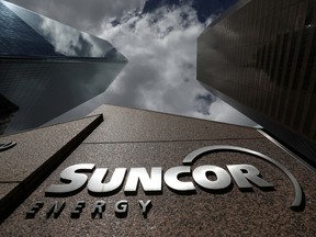 Suncor reported a net loss of $168 million in the three months ended Dec. 31, compared with a net loss of $2.335 billion a year earlier.