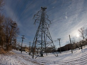 A transmission tower supports power lines after a snow storm on February 16, 2021 in Fort Worth, Texas.