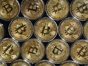 The first exchange-traded fund tracking Bitcoin in North America begins trading in Toronto on Thursday.