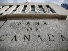 A sign saying "Bank of Canada" is pictured outside the Bank of Canada building in Ottawa.