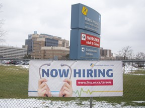 A now hiring sign outside a hospital in London, Ont.