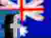 A 3D printed Facebook logo is seen in front of Australia's flag.