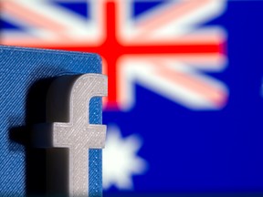 A 3D printed Facebook logo is seen in front of Australia's flag.